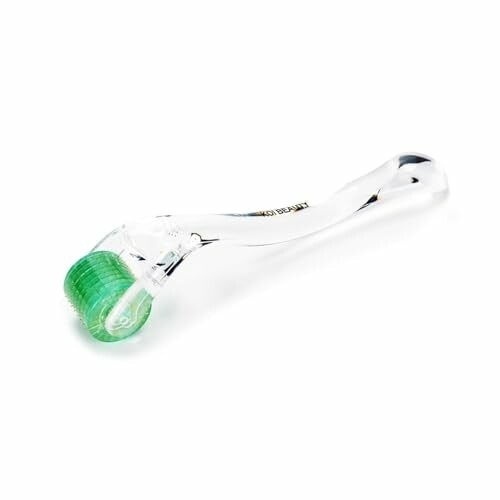Clear-handled derma roller with green micro-needles